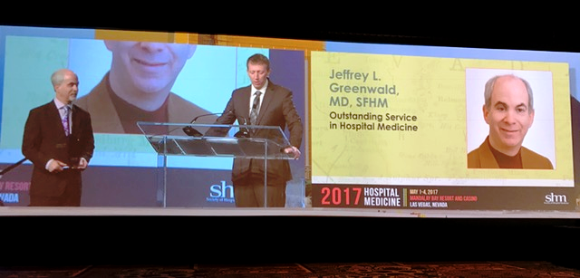 Dr. Jeff Greenwald recieves his award